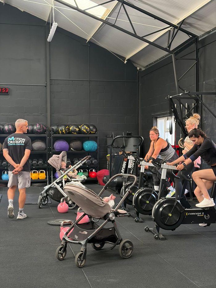Buggy Fit at Motion CrossFit GU1, mums on the bikes with buggies beside them